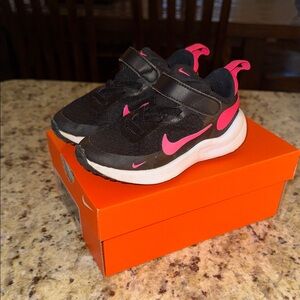 Nike Kids “Revolution series 7”Black and Pink Athletic Sneakers